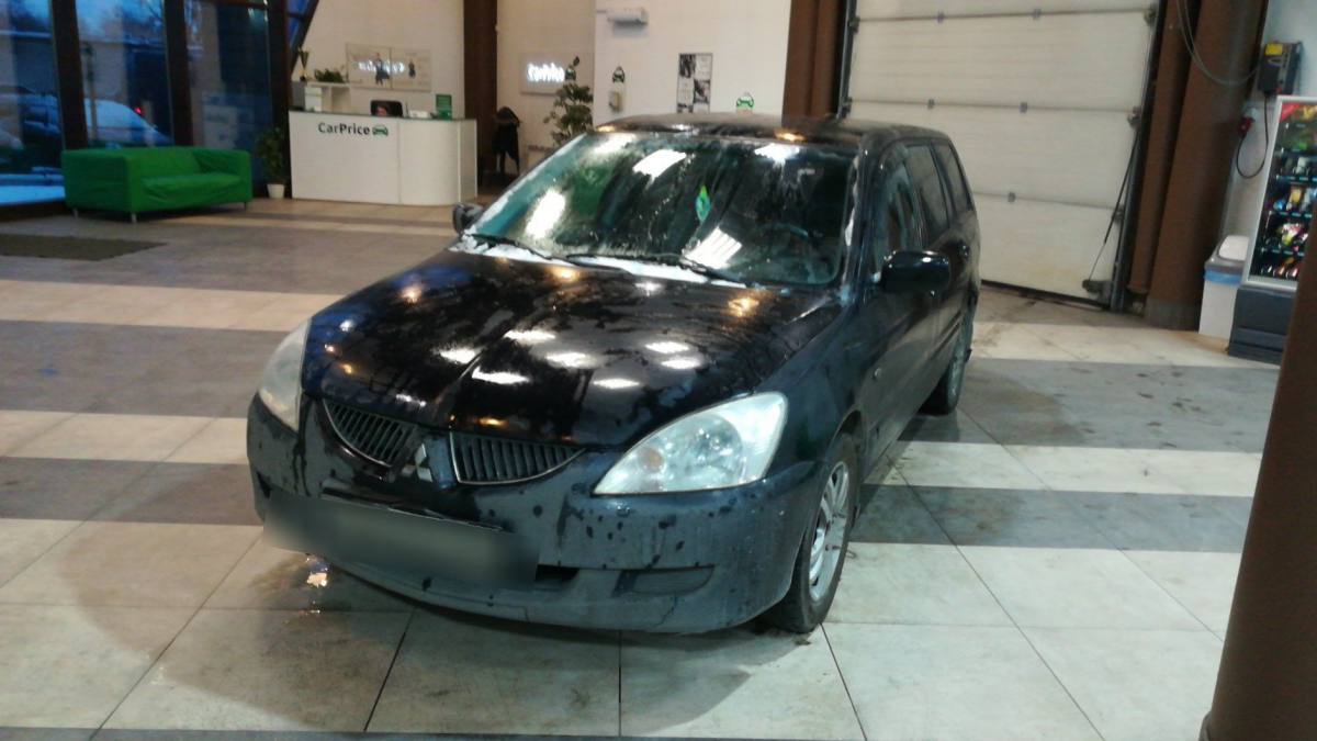 Mitsubishi Lancer IX 1.6 MT (98 л.с.) [2004]