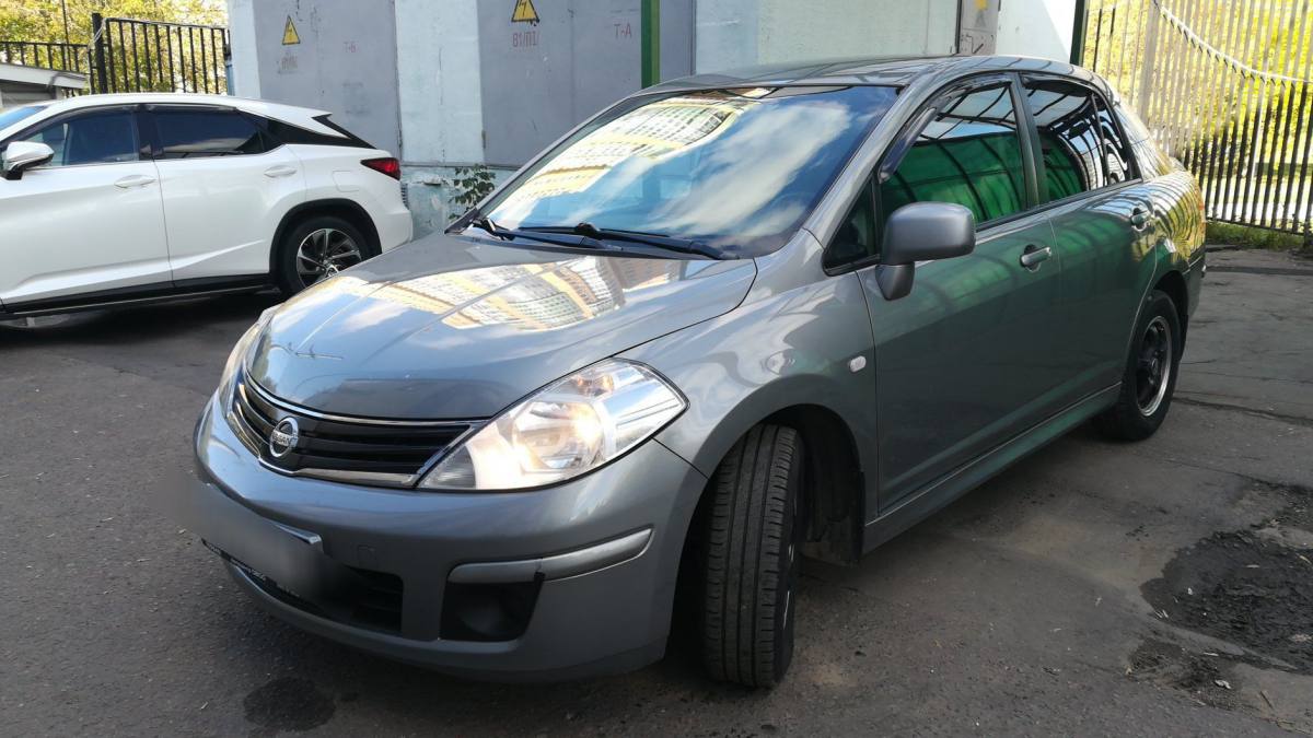 Nissan Tiida I Рестайлинг